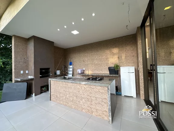 Imagem Casa Linear com 4 Suítes e Amplo Quintal no Condomínio Riviera Park
