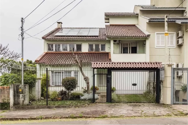 Imagem Casa com 3 Quartos à Venda, 464 m² em Santo Antônio - Porto Alegre