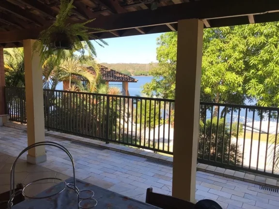 Imagem EXCELENTE RANCHO COMPLETO COM ACESSO Á ÁGUA EM ESTREITO COM ASFALTO ATÉ Á PORTA - 04 dormitórios sendo 03 suítes - Varanda contornando toda á casa
