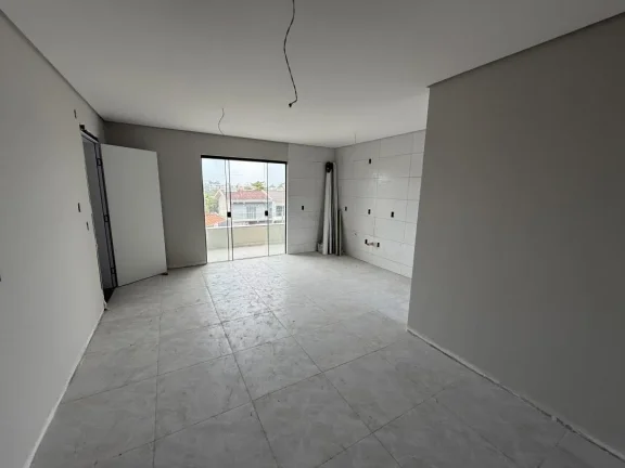 Imagem Apartamento de dois dormitórios, sendo uma suíte, sacada com churrasqueira e uma vaga de garagem no bairro de Gravatá, em Navegantes - Adriano Carpes imóveis vende