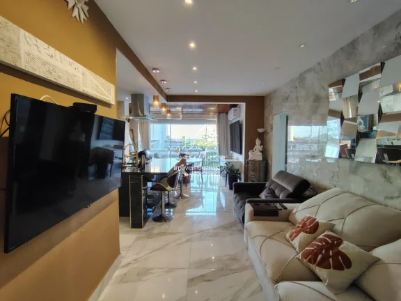 Imagem Imperdível! Apartamento de 2 quartos com suíte e 2 vagas de garagem em Pitangueiras, Guarujá-SP - 78m² de conforto e elegância!