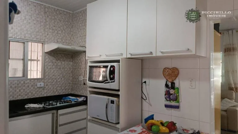 Imagem Casa com 3 dormitórios à venda, 180 m² por R$ 850.000,00 - Aviação - Praia Grande/SP