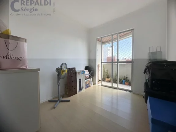 Imagem Apartamento de 3 quartos com suíte e vaga de garagem no Centro de Criciúma-SC: oportunidade imperdível!