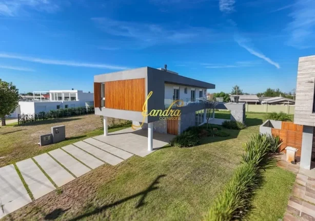 Imagem Sobrado novo com 05 suítes