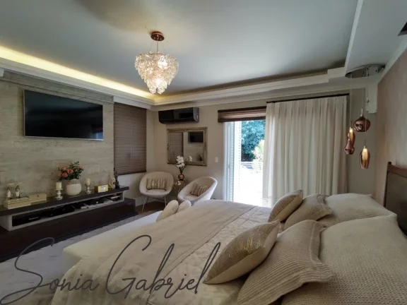 Imagem Luxuosa casa em condomínio à venda em Condomínio Terras de Vinhedo, Vinhedo-SP: 4 quartos, 4 suítes, 3 salas, 6 banheiros, 4 vagas de garagem, 560m². Imagem Luxuosa casa em condomínio à venda em Condomínio Terras de Vinhedo, Vinhedo-SP: 4 quartos, 4 suítes, 3 salas, 6 banheiros, 4 vagas de garagem, 560m².