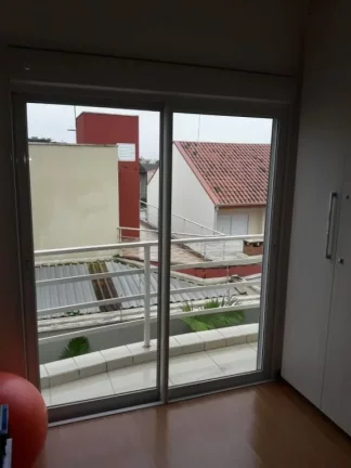 Imagem Sobrado com 3 dormitórios à venda, 148 m² por R$ 720.000,00 - Jardins do Paraíso - Mogi das Cruzes/SP