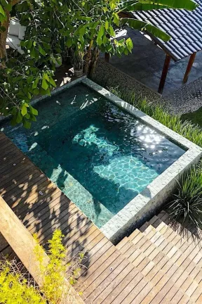 Imagem Casa com 3 dormitórios sendo 2 suítes com jardim e piscina Praia de Taquaras, Balneário Camboriú SC