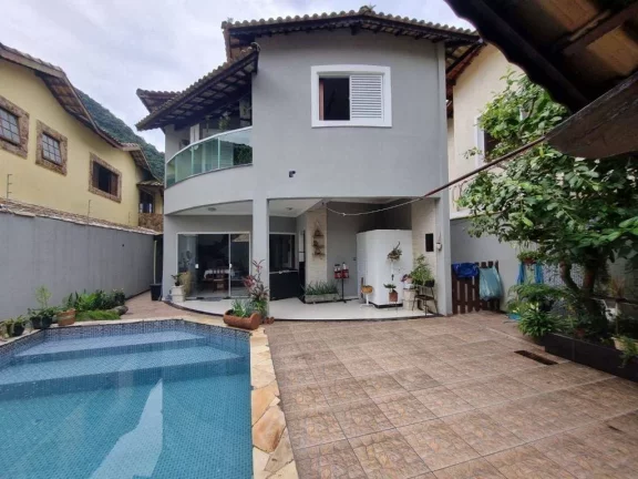Imagem Sobrado com 3 dormitórios à venda, 200 m² por R$ 2.500.000,00 - Canto do Forte - Praia Grande/SP