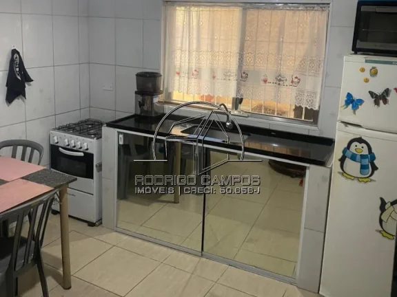 Imagem Espaçosa Casa Geminada à Venda no Tupiry, Praia Grande - 3 Quartos