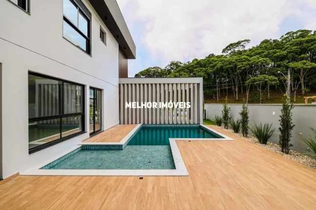 Imagem Casa Alto Padrão à Venda com 04 suítes, localizada em Condomínio fechado em Camboriú