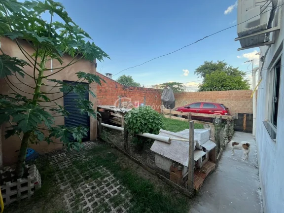 Imagem Casa à Venda em Campo Grande-MS no Bairro Tiradentes com 3 Quartos e 90m² de Área