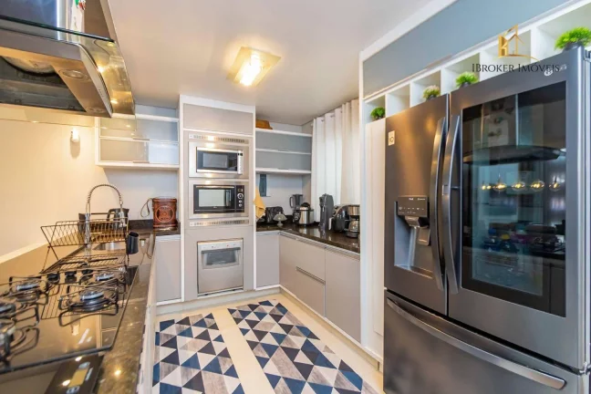 Imagem Sobrado mobiliado com 3 suítes à venda, 185 m² por R$ 1.530.000 - Uberaba - Curitiba/PR