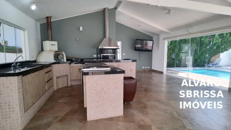 Imagem Casa com piscina, área gourmet e grande quintal. Estuda permuta com imóvel comercial. 395 m². Condomínio Zuleika Jabour Salto/SP