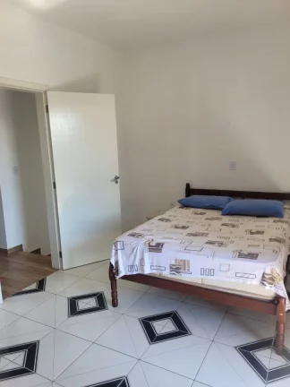 Imagem Imperdível oportunidade de adquirir uma casa com 3 quartos e 6 vagas de garagem em Balneário Rincão-SC, Zona Norte! BRP012