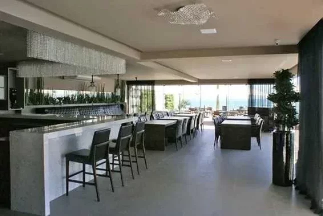 Imagem Apartamento frente mar mobiliado com 4 suítes e 3 vagas de garagem em Itapema