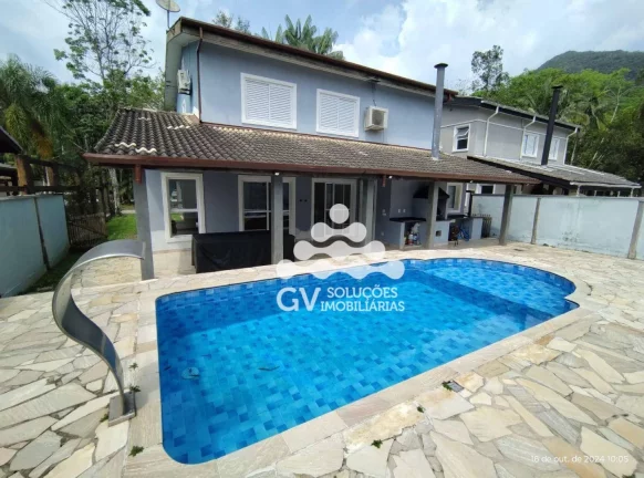 Imagem Casa com 4 dormitórios à venda, 210 m² por R$ 1.500.000,00 - Condomínio Capitanias - Ubatuba/SP