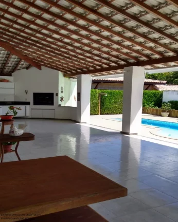 Imagem Casa de luxo em condomínio à venda em Busca Vida, Camaçari-BA: 4 quartos, 4 suítes, 2 salas, 2 banheiros, 4 vagas, 450m².