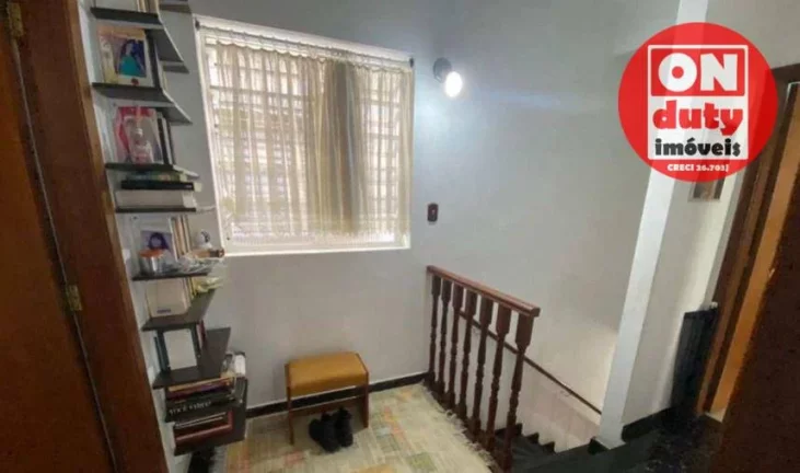 Imagem Casa com 3 dormitórios à venda por R$ 950.000,00 - Estuário - Santos/SP