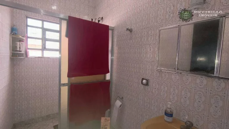 Imagem Casa com 3 dormitórios à venda, 240 m² por R$ 700.000,00 - Caiçara - Praia Grande/SP