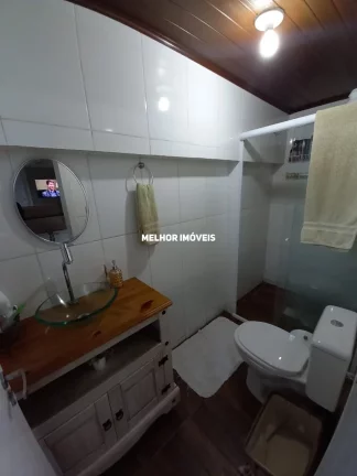 Imagem Casa de Alvenaria com 4 Dormitórios sendo 3 suítes localizado em Banheiros em Camboriú