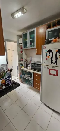 Imagem Apartamento com 47 M², 2 dormitórios, 1 banheiro, sala, cozinha, área de serviços e 1 vaga de ga...