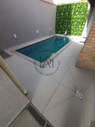 Imagem Casa para Venda em Praia Grande, Mirim, 2 dormitórios, 1 suíte, 3 banheiros, 3 vagas