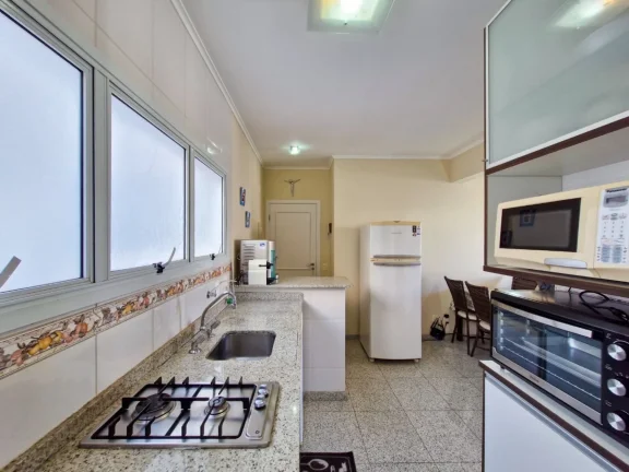 Imagem Apartamento pé na areia à venda em Riviera de São Lourenço Módulo 07: 2 vagas, 2 dormitórios, 1 suíte, 68m² - Varanda gourmet