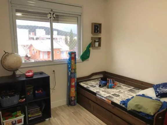 Imagem Apartamento com 3 dormitórios sendo 1 suíte e 2 vagas de garagem em Bombas, Bombinhas/SC