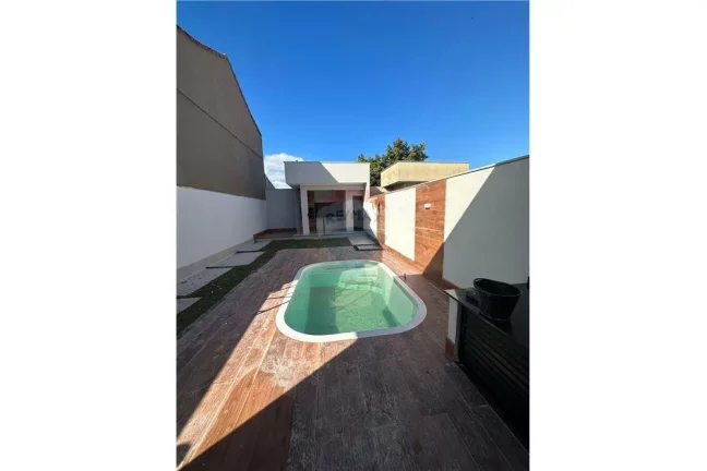 Imagem Uma casa belíssima em uma localização espetacular PRÓXIMO A PRAIA