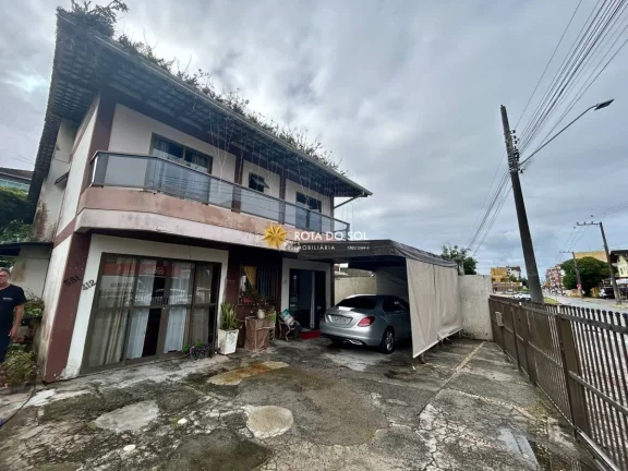 Imagem Terreno de quadra com 2 casas à venda Bombas Bombinhas SC