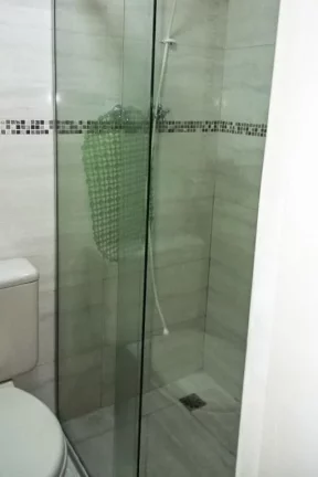 Imagem Flat com 3 dormitórios à venda, 112 m² por R$ 700.000,00 - Pitangueiras - Guarujá/SP