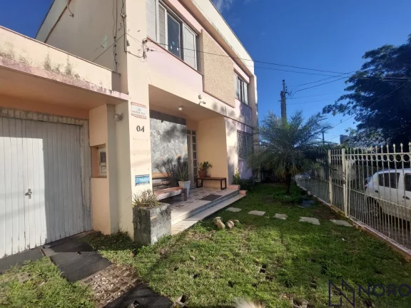 CASA 3 DORMITÓRIOS (1 SUITE) 4 VAGAS NA TRAV. DOMINGOS TREVISAN-CENTRO
