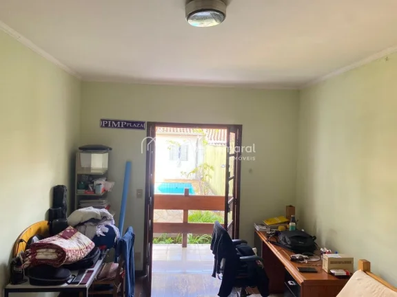 Imagem Esta encantadora residência oferece um espaço amplo e confortável, com quatro dormitórios, sendo...