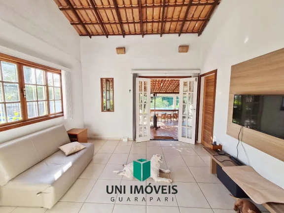 Imagem Linda casa com piscina, jardim e 902m² de terreno a venda na Enseada Verde - Guarapari