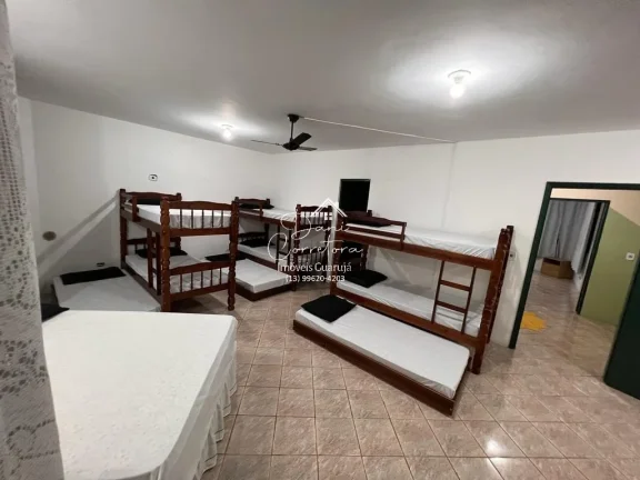 Imagem Casa Jardim Virginia com 4 quartos, 4 suítes, 3 salas e 8 vagas de garagem no Guarujá-SP, bairro Loteamento João Batista Julião!