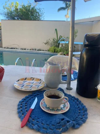 Imagem Casa de Locação Temporada com Piscina e Quiosque com Área Gourmet