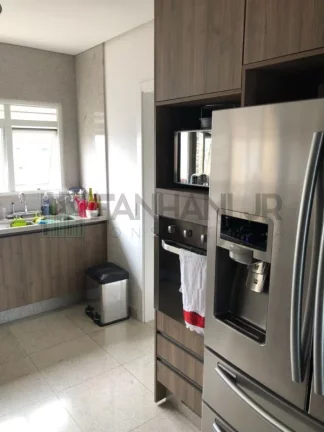 Imagem Luxuosa cobertura duplex de alto padrão na cobiçada Vila Nova Conceição, com incríveis 411m² e 5 vagas de garagem. Com um design clean e moderno, as