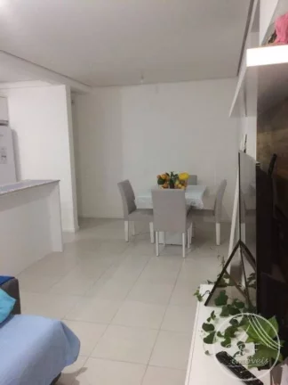 Imagem Vendo apartamento em Bairro Arreias São José SC, de três dormitórios, suíte, duas vagas livres, cozinha e área de serviço mobiliados.