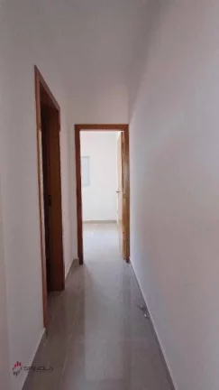 Imagem Sobrado com 2 dormitórios à venda, 62 m² por R$ 460.000,00 - tude basto - Praia Grande/SP