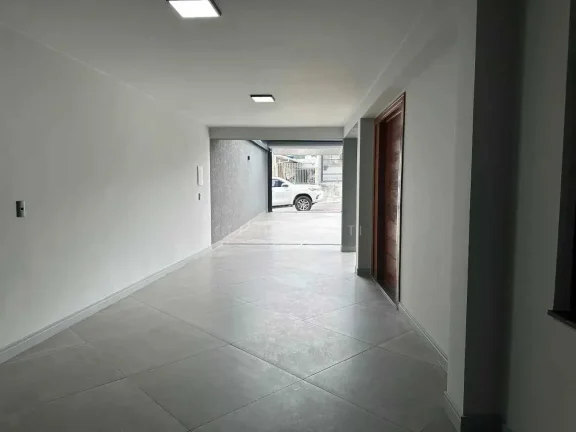 Imagem Casa nova de alto padrão com 4 suítes e 3 vagas de garagem em Itajaí/SC