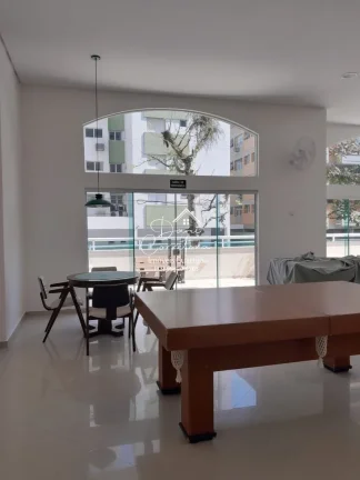 Imagem Apartamento à venda na Enseada, Guarujá-SP: 3 quartos, 1 suíte, 2 salas, 3 banheiros, 2 vagas de garagem, 85m² de área.