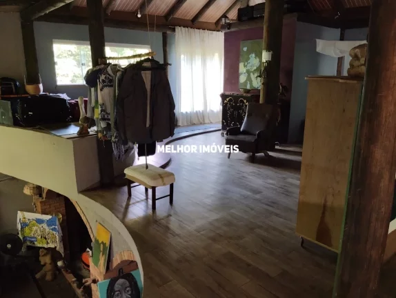 Imagem Casa Rústica à venda localizado na Praia do Estaleiro em Balneário Camboriú - SC