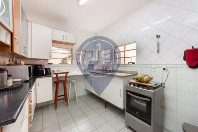 Imagem Casa à venda em São Paulo-SP, bairro Jardim Pinheiros: 3 quartos, 1 suíte, 2 salas, 3 banheiros, 2 vagas, 124m². Confira!