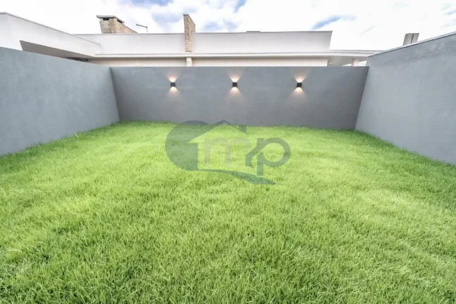 Imagem Casa a venda com 3 dormitorios no Morada das Palmeiras em Torres/RS
