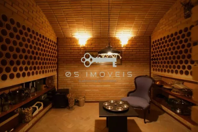 Imagem Casa alto padrão à venda na Aldeia da Serra com 7 suítes e espaço gourmet
