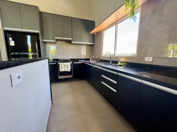 Imagem Casa com 4 suítes em condomínio em Porangaba - SP