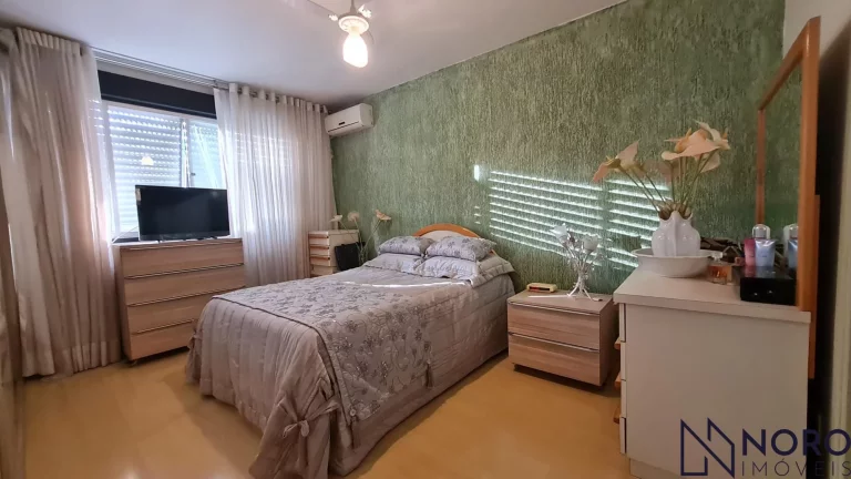 Imagem Apartamento Central de 3 Dormitórios com Suíte e Garagem - Semi Mobiliado