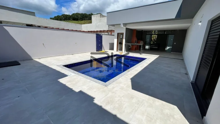 Imagem CASA EM CONDOMINIO FECHADO COM 4 DORMITÓRIOS SENDO 4 SUÍTES,2 VAGAS DE GARAGEM,VARANDA GOURMET COM CHURRASQUEIRA E PISCINA.