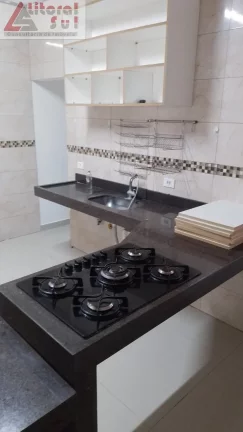 Imagem Casa à venda em Praia Grande-SP, bairro Ocian: 2 quartos, 1 sala, 1 banheiro, 2 vagas, 150m². Imperdível oportunidade!