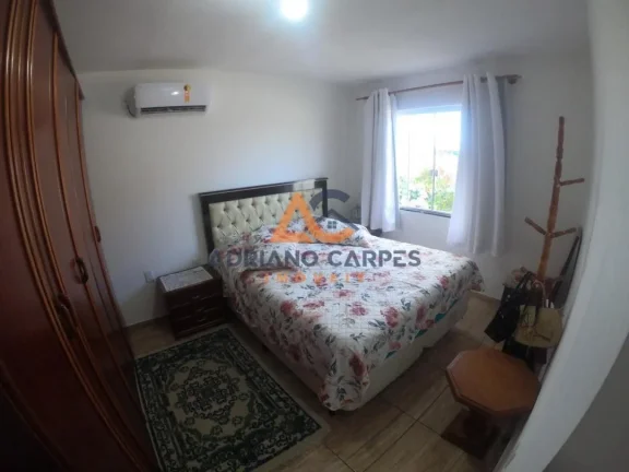 Imagem Casa com 3 dormitórios, sendo 1 suíte, na praia de Itajúba em Barra Velha / SC Adriano Carpes Imóveis vende